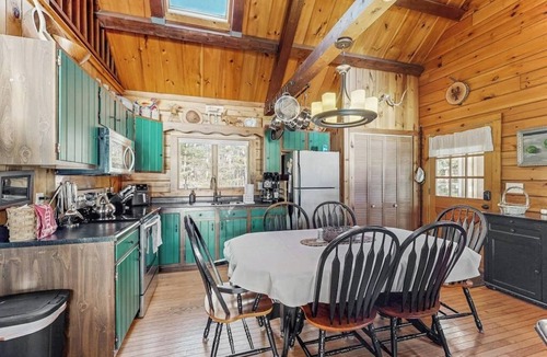 Wiscasset House | Charming riverfront home with cozy interiors, dock, and scenic deck views