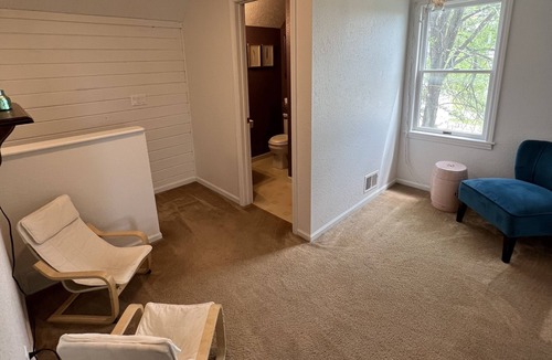 Bellaire Cottage | Charming Stone Cottage in Downtown Bellaire