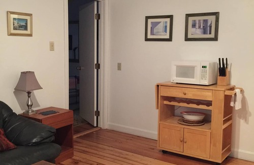 Commercial Street Condo | Charming West End 1 Bd 1st Fl - Steps to Beach - With Private Parking