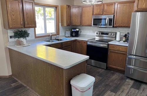 Sioux Falls House | Cheerful 4-Bedroom with Garage