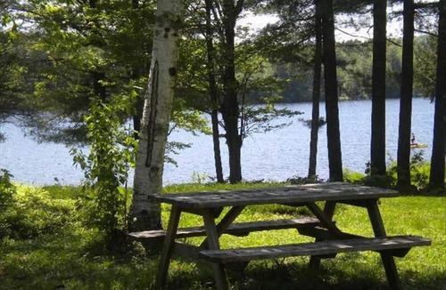 Oxford Cabin | Classic Maine Lakefront Cabin, Porch and Canoe