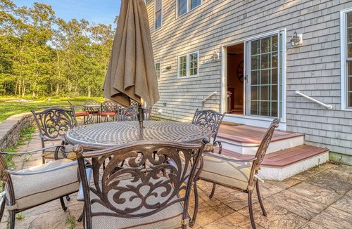 Lagoon Heights House | Classic, private estate with a large lot, a stone patio & a fireplace!
