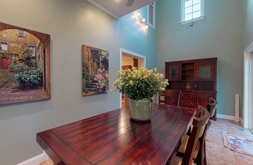Lagoon Heights House | Classic, private estate with a large lot, a stone patio & a fireplace!