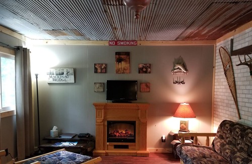 Wellston Cabin | Clean, comfortable cabin within walking distance to Tippy Dam!
