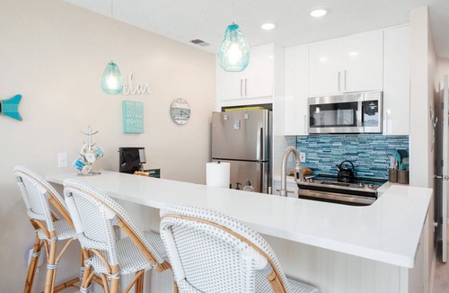 Traverse City Condo | Coastal Serenity 108 Beachfront Condo Near Downtown