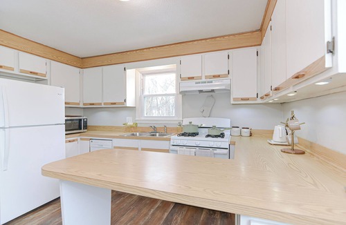 Lowell Apartment | Comfort Oasis with Private Garage. Steps from UMass Lowell & 35 min from Boston