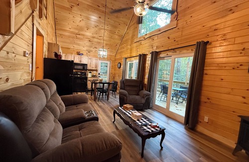 Logan Cabin | Cozy 2-bedroom log cabin Logan with Hot Tub and fire pit