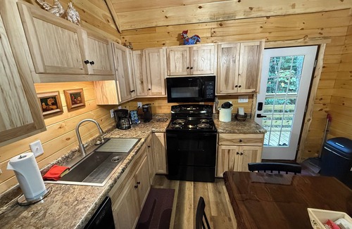 Logan Cabin | Cozy 2-bedroom log cabin Logan with Hot Tub and fire pit