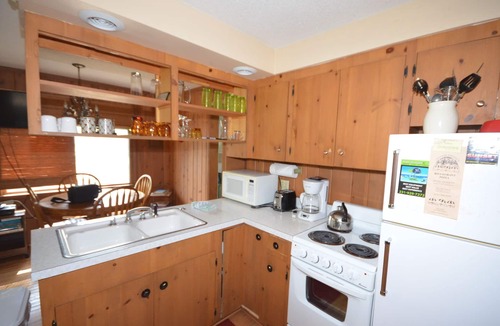 Glen Arbor House | Cozy cabin in Glen Arbor w/Crystal River frontage. WIFI, fire pit, dog ok