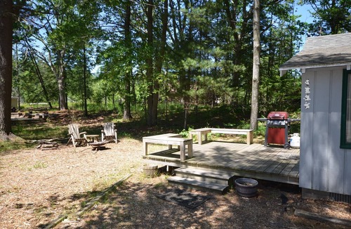 Glen Arbor House | Cozy cabin in Glen Arbor w/Crystal River frontage. WIFI, fire pit, dog ok