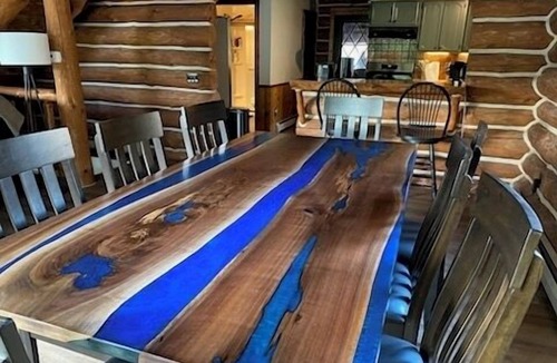 Pentwater Cabin | Cozy cabin on the Pentwater River with hot tub, central air and ample parking.