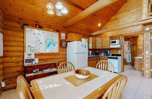 Mercer Cabin | Cozy cabin w/fireplace, whirlpool tub, access to private dock, & fire pit