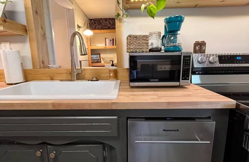 Warrensburg Cottage | Cozy Campus Art Cottage