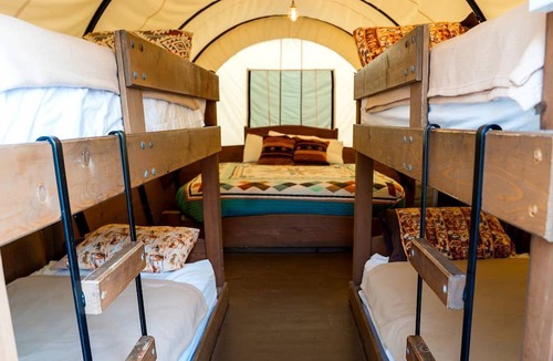 South Oklahoma City House | Cozy Conestoga Covered Wagon for 6 on Oklahoma Farm, for Memorable Glamping Vacations