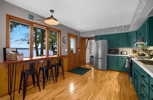 Stone Lake Cabin | Cozy family-friendly A-frame on sandy beachfront - dogs welcome!