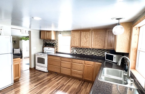 Battle Lake House | Cozy home | Steps away from downtown and West Battle Lake | Private patio