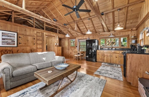 Le Roy Cabin | Cozy log cabin on Lake, fireplace, bonfire, kayaks, dock, orv trails, and grill,