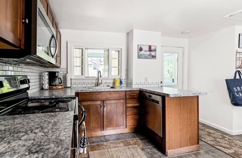 Grand Haven House | Cozy lower level duplex. Pet friendly with a large backyard!