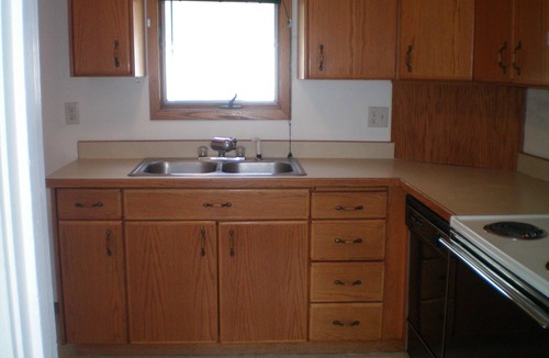 Minot House | Cozy Nostalgic 2 bedroom, 1 1/2 Bath 2 Story Home With fence, deck & garage.