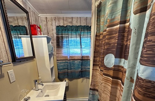 Jonesport House | Cozy ranch home situated off the main road overlooking Moosabec Reach.