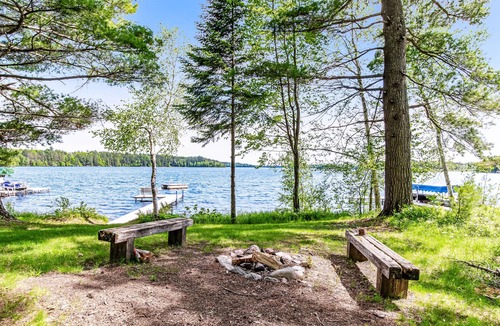 Lac du Flambeau House | Cozy Waterfront Cabin with Deck, Boat Dock, Kayak & Fire Pit