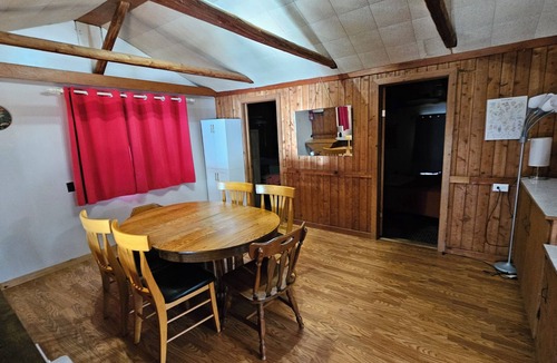 Lake Ann House | Cozy waterfront sunset cottage on Herendeene Lake in Lake Ann, Dock, Dog ok