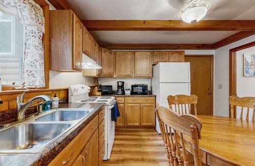 Friendship House | Cozy wooded duplex w/WiFi, full kitchen, shared W/D & near lakes & trails