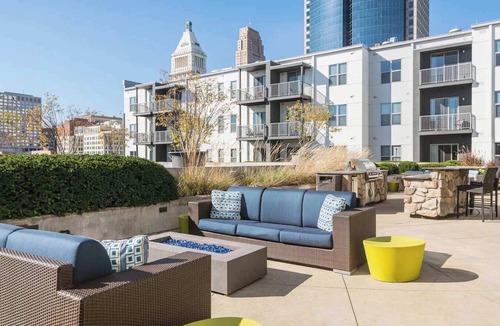 Central Business District Apartment | CozySuites at the Banks gym, pool 13