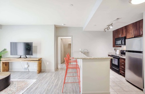 Central Business District Apartment | CozySuites at the Banks gym, pool 15