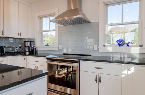 Green Hill House | Custom Waterfront Home on Green Hill Pond with kayaks, walk to beach