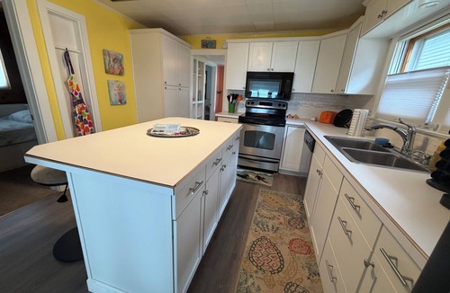 Bay City House | Cute house on Saginaw Bay with hot tub on private beach.