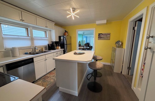 Bay City House | Cute house on Saginaw Bay with hot tub on private beach.