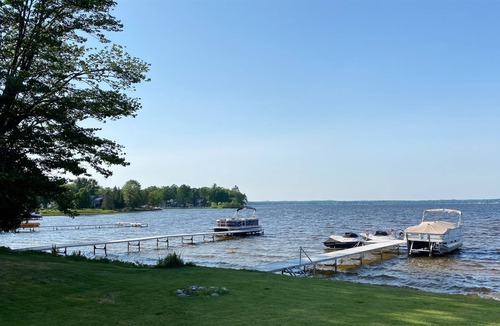 Cadillac Cottage | Cute lakefront cottage on Lake Mitchell in Cadillac, Michigan