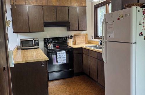 Drummond House | Dad's Paradise on Pigeon Cove offers WaterFront Sunrise Views and Lake Access!