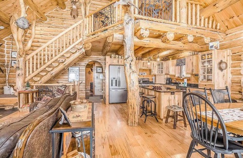 Thompsonville House | Delightful Riverfront Cabin with Wood-Burning Fireplace and Gas Grill & Hot Tub