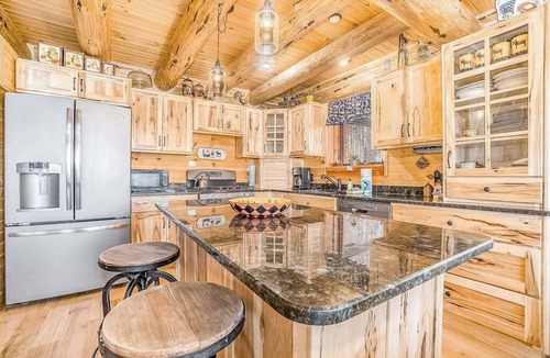 Thompsonville House | Delightful Riverfront Cabin with Wood-Burning Fireplace and Gas Grill & Hot Tub