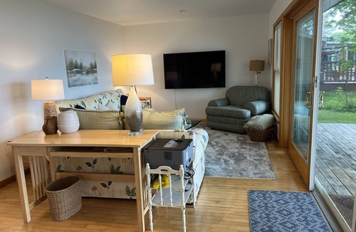 Interlochen Cottage | Delightful sunny beachfront cottage with fire pit 4 min to Concerts!