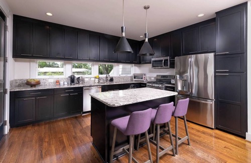 West Suburb House | Designer home is short walk to Rupp & Manchester