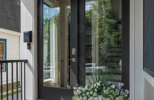 West Suburb House | Designer home is short walk to Rupp & Manchester