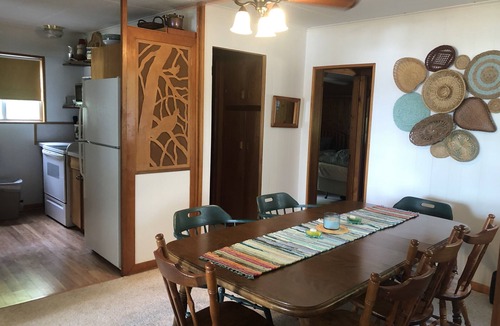 Traverse City House | Direct Lake Leelanau sunset view, fire pit, grill, dock, boat lift, dog ok