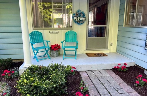 Traverse City House | Direct Lake Leelanau sunset view, fire pit, grill, dock, boat lift, dog ok