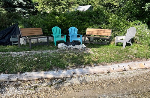 Traverse City House | Direct Lake Leelanau sunset view, fire pit, grill, dock, boat lift, dog ok