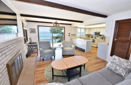 Suttons Bay House | Direct waterfront on West Grand Traverse Bay! Overlooking deck