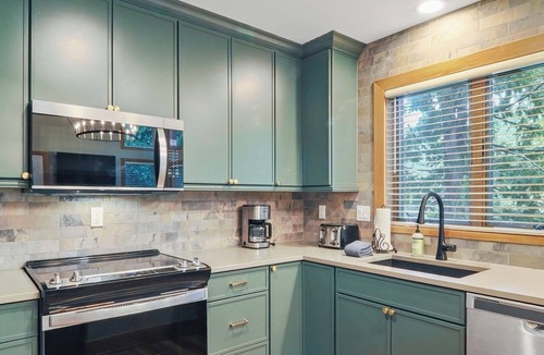 Boyne Falls Condo | Disciples Village #678 | optional lower unit expansion for rental | Fireplace