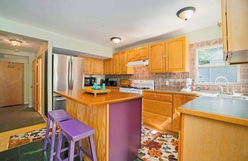Empire House | Dog-friendly cottage with fenced yard, firepit, W/D, & WiFi - walkable location