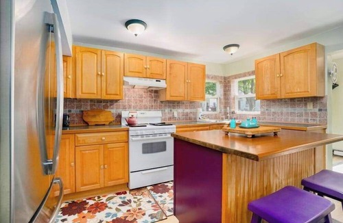 Empire House | Dog-friendly cottage with fenced yard, firepit, W/D, & WiFi - walkable location