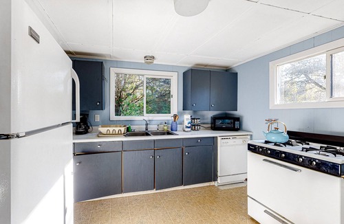 Lagoon Heights House | Dog-Friendly Downtown Home w/Free WiFi, Deck, Water Views, & Partial A/C