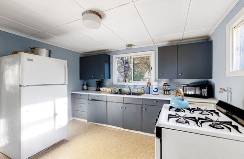 Lagoon Heights House | Dog-Friendly Downtown Home w/Free WiFi, Deck, Water Views, & Partial A/C