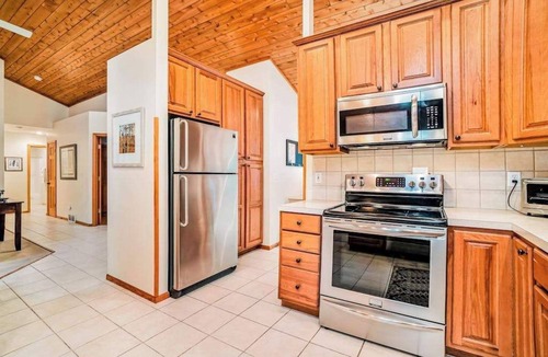 Glen Arbor House | Dog-friendly home with gorgeous garden & decks - stroll to town/the lake