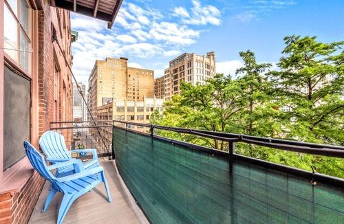 Downtown West Apartment | DWTN Loft✦160" Theater Screen✦Walk to Attractions✦Private Balcony